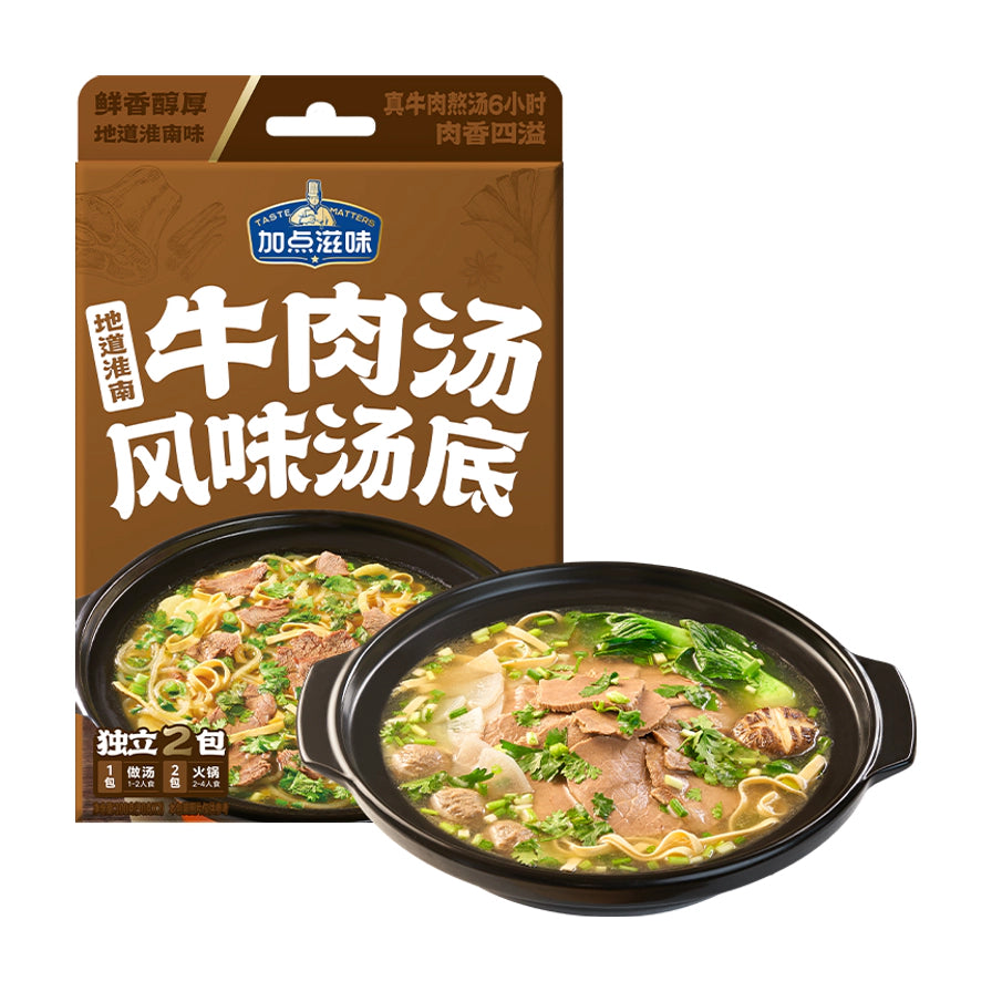 加点滋味地道淮南牛肉汤风味汤底包装，棕色袋装设计，展示两碗煮好的牛肉汤成品，配有面条、肉片和青菜。