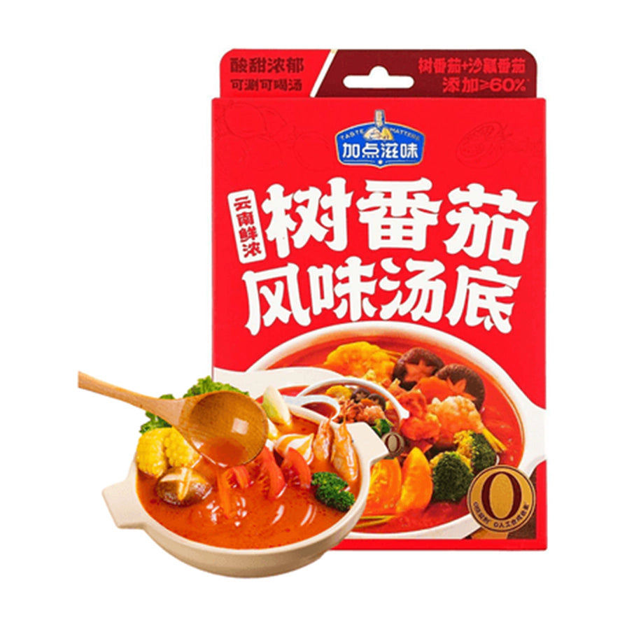 加点滋味云南鲜浓树番茄风味汤底包装，红色袋装设计，展示一碗红汤，内含虾、玉米、西兰花和蘑菇。