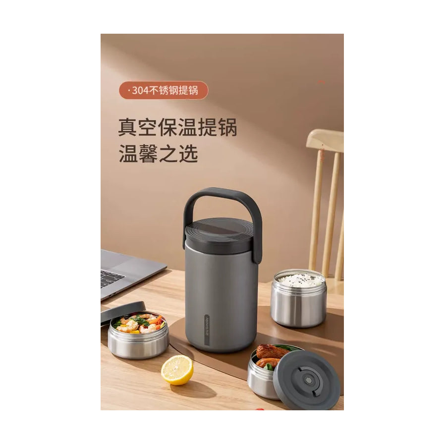 九阳真空保温提锅置于木质桌面，配有中文标题“真空保温提锅 温馨之选”，展示分体式内胆及食物。