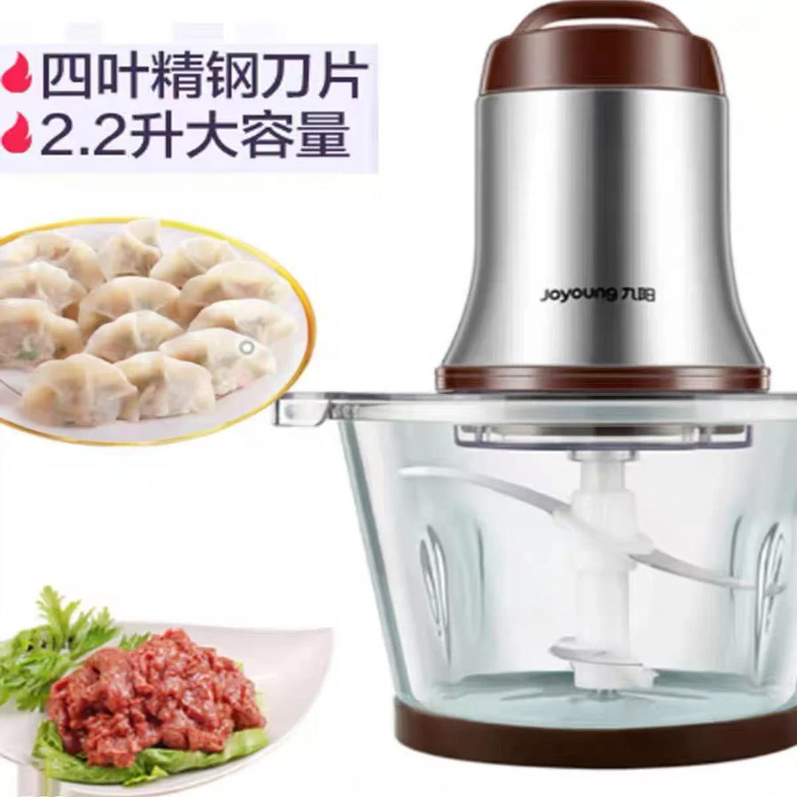 九阳电动碎肉机，左侧展示饺子和肉馅，上方标有四叶精钢刀片及 2.2 升大容量文字。