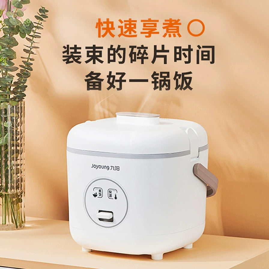 九阳电饭煲放置在暖色调背景的桌面上，上方配有“快速享煮”中文宣传文字。