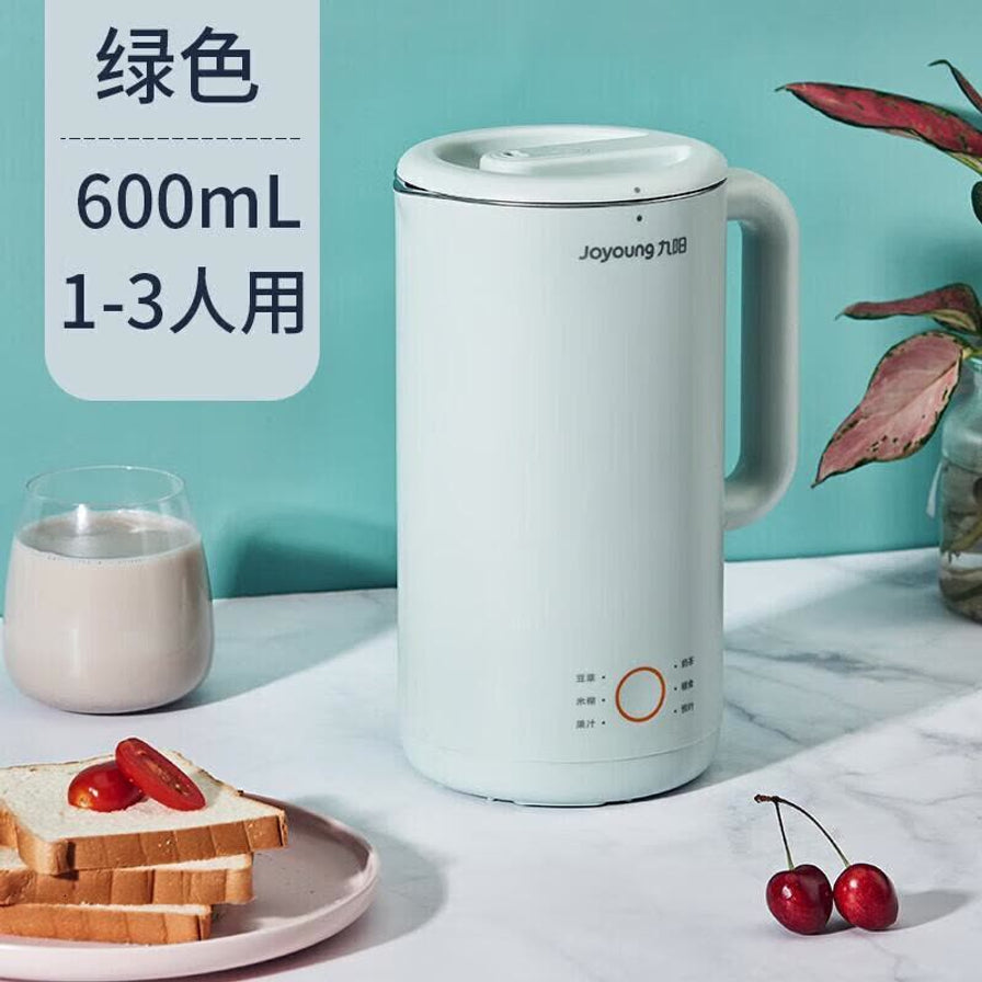 九阳蓝色豆浆机，左侧带有“蓝色 600mL 1 - 3人用”文字标识，背景配有早餐面包和樱桃。