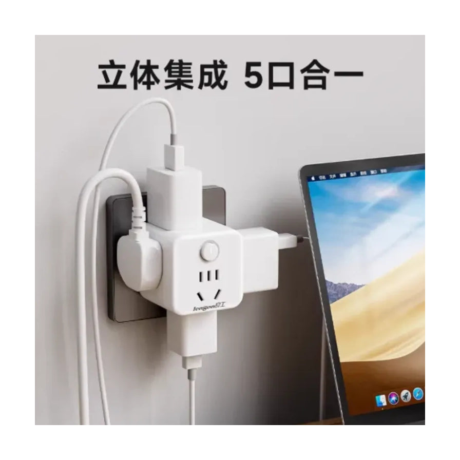 良工魔方插座在办公场景下的应用，插座插在墙面面板上并连接多个充电头和电线，上方配有“立体集成 5口合一”文字。
