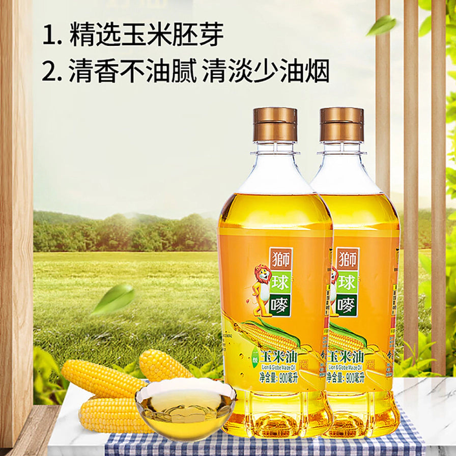 两瓶狮球麦玉米油并排摆放，背景为绿色农田，配有文字说明精选玉米胚芽、清香不油腻。
