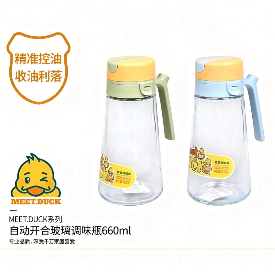 MEETDUCK小黄鸭自动开合玻璃调味瓶展示图，带有“精准控油、收油利落”文字说明及品牌Logo，展示660ml容量规格。