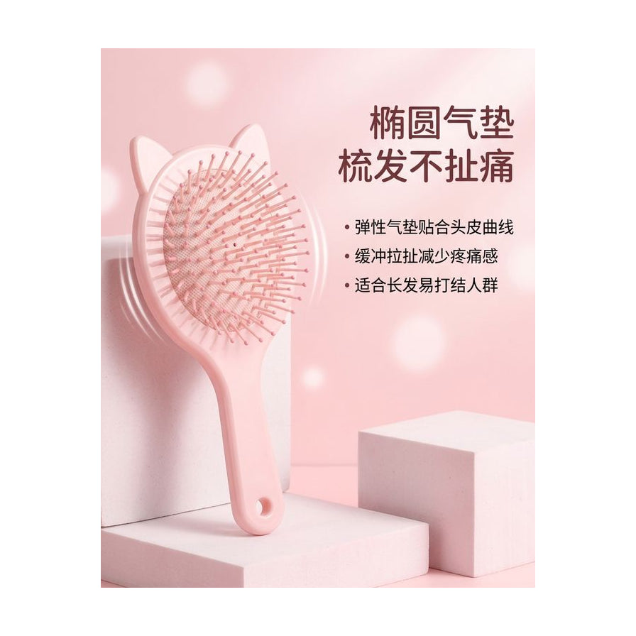 粉色猫耳梳产品卖点图，配有中文说明文字介绍气垫缓冲功能。