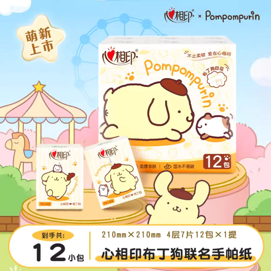 心相印布丁狗联名手帕纸海报，展示1提12包规格，标注尺寸210mmx210mm及4层7片规格。