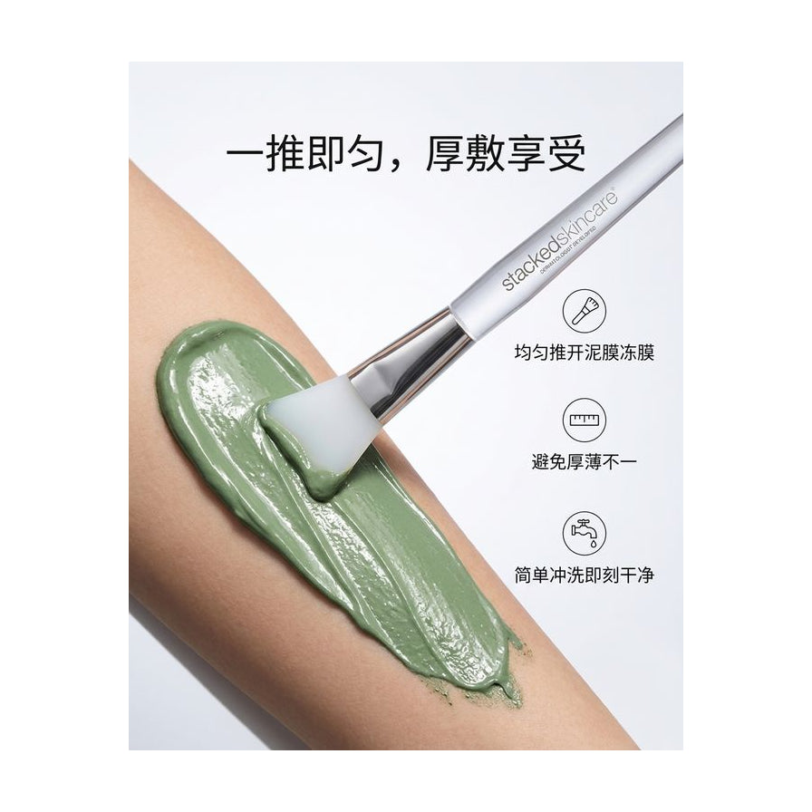 面膜刷在手臂上均匀推开绿色泥膜的演示图，配有中文卖点说明及功能图标。