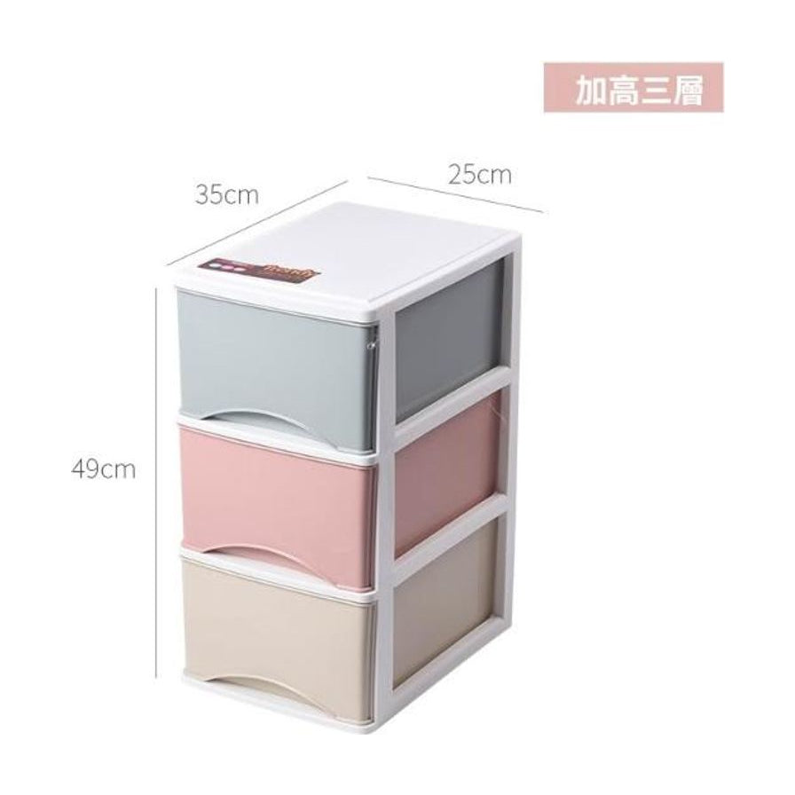 白色三层储物箱正面展示图，抽屉面板分别为浅蓝、粉红和米色，图片标注了长宽高尺寸及“加高三层”字样。