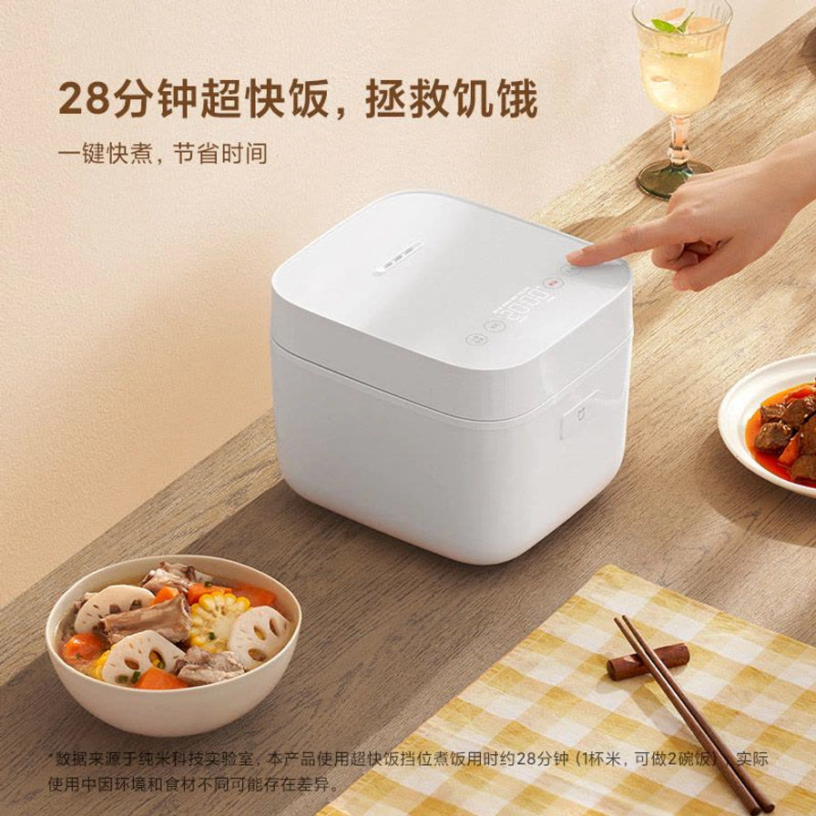 小米米家智能小饭煲2顶部触控面板操作演示，配有“28分钟超快饭”宣传文字。