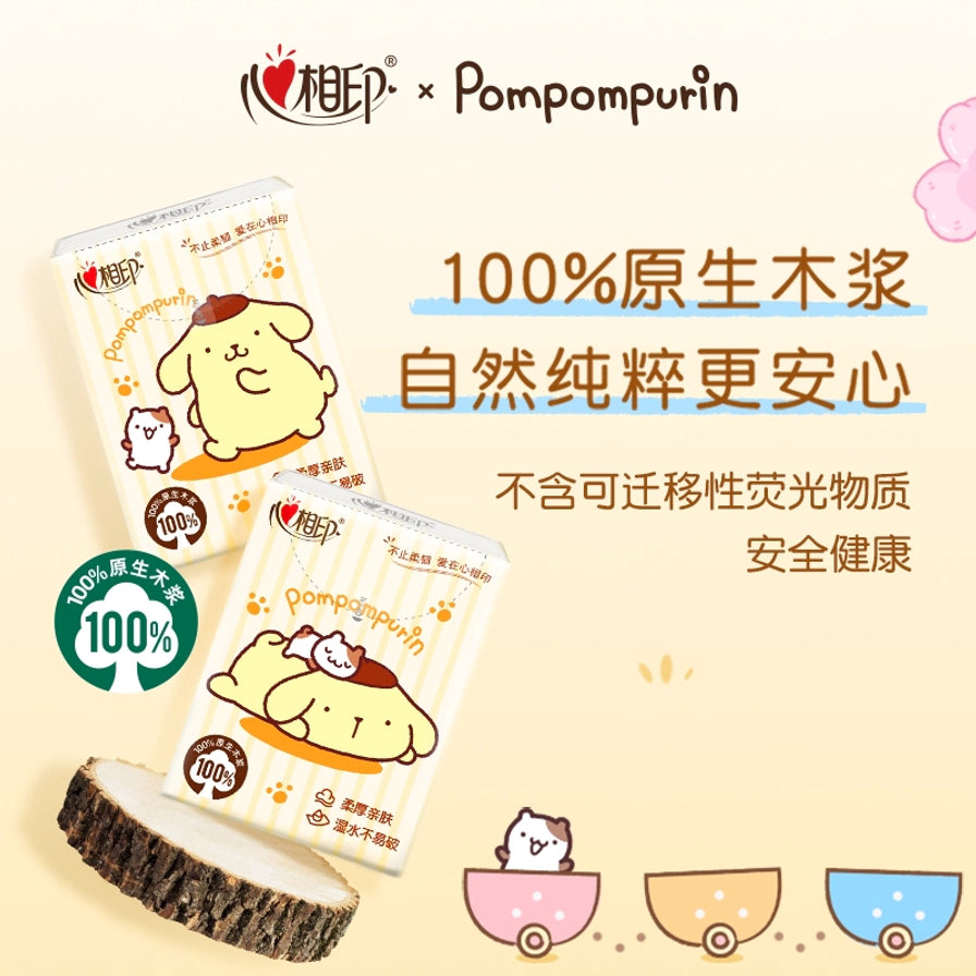 心相印布丁狗手帕纸宣传图，标注100%原生木浆，不含可迁移性荧光物质，安全健康。