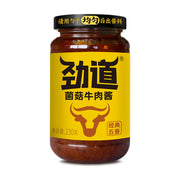 仲景劲道菌菇牛肉酱经典五香口味230g瓶装，黄色标签，正面印有牛头图案和劲道字样。