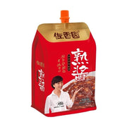 佐香园熟酱 450g 自立袋装正面图，红色包装配橙色螺旋盖，印有品牌代言人肖像及酱料实物图。
